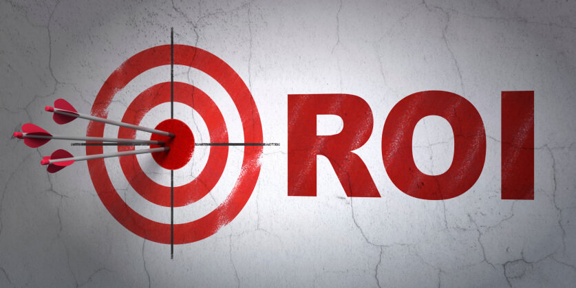 Business concept: target and ROI on wall background